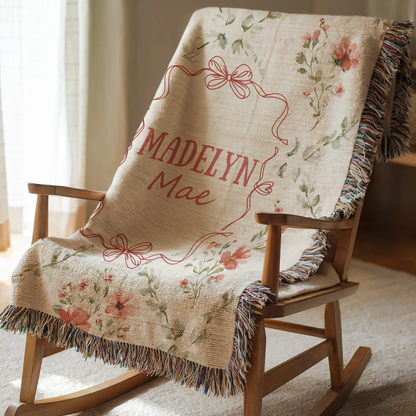 Personalized floral baby blanket with bow frame and custom name for girl nursery decor
