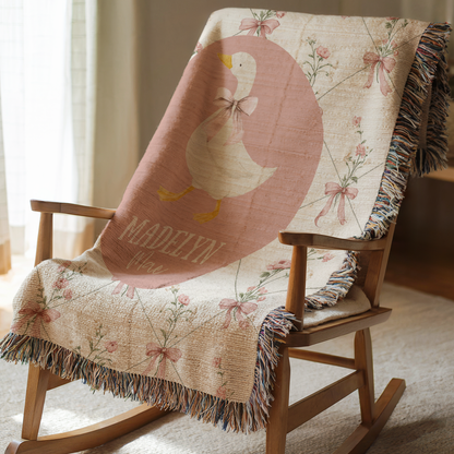 Personalized pink goose baby blanket with floral bows and custom name for vintage girl nursery decor