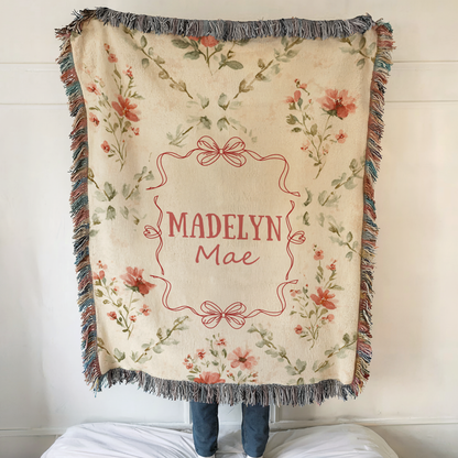 Personalized floral baby blanket with bow frame and custom name for girl nursery decor
